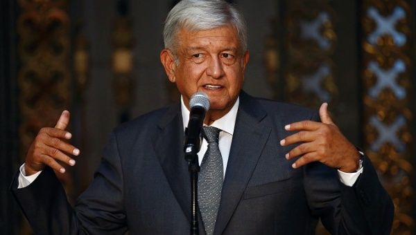 Mexico's president-elect Andres Manuel Lopez Obrador addresses the media after a private meeting with Mexico's President Pena Nieto in Mexico City.