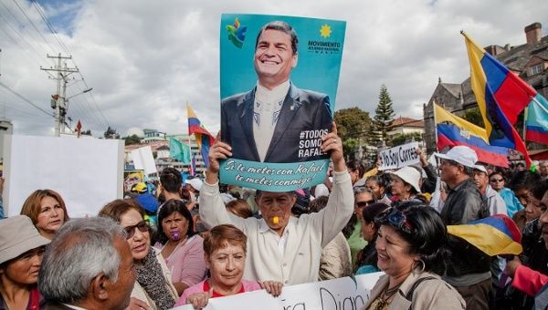 Rafael Correa's supporters march against his international arrest order, issued by Lenin Moreno's government, in Quito, Ecuador, July 5, 2018.