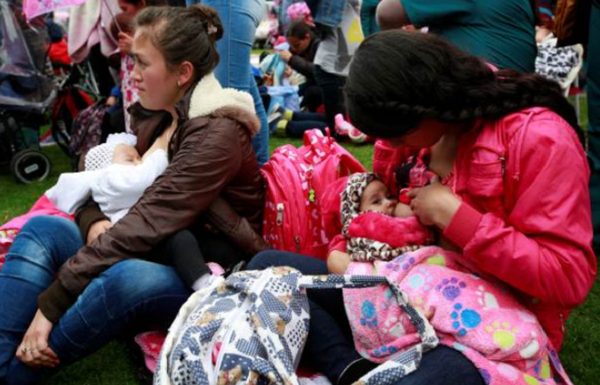 Mothers breastfeed their babies, as part of the celebration for World Breastfeeding Week, at Lovers Park in Bogota, Colombia.