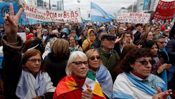 Demonstrators attend a protest against the President Mauricio Macri's government agreement with the International Monetary Fund (IMF) in Buenos Aires, Argentina, July 9, 2018. 