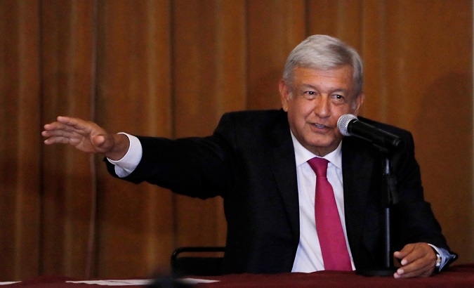 AMLO talks during a media conference.
