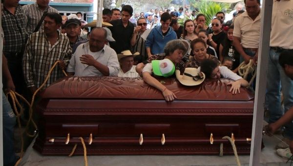 Relatives and friends attend funeral ceremony of candidate for local deputy Abel Montufar Mendoza, at the central pantheon, in Guerrero, Mexico, 10 May 2018. 
