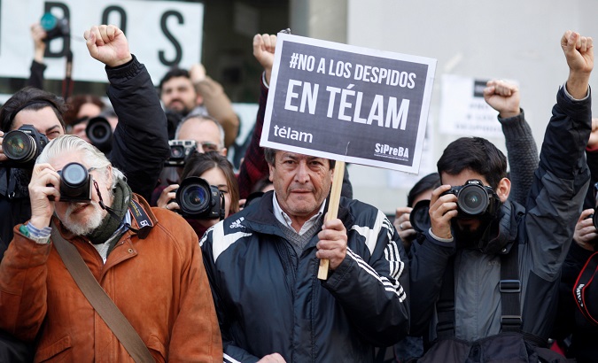 Argentine journalists protest the lay-off of over 300 employees from public news agency Telam in Buenos Aires.