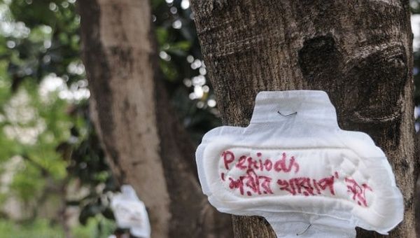 A sanitary towel with the message ‘menstruation is not an illness’, pinned on a tree during a protest in Kolkata, India.