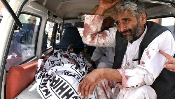 A man mourns the death of a relative, who was killed in a suicide blast in Quetta. 