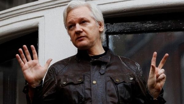 WikiLeaks co-founder Julian Assange is seen on the balcony of the Ecuadorean embassy in London.
