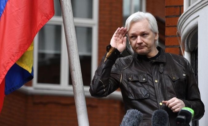 WikiLeaks founder Julian Assange is seen on the Ecuadorean Embassy in London.