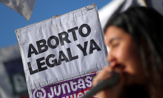 A sign reads 'Legal Abortion Now' during a demonstration outside the Congress in Buenos Aires, Argentina, July 31, 2018.