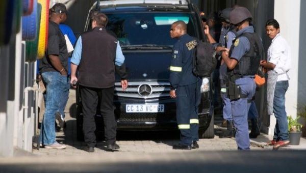 Police raid the home of the Gupta family in Johannesburg, South Africa