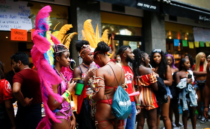 Revellers take part in the Notting Hill Carnival.