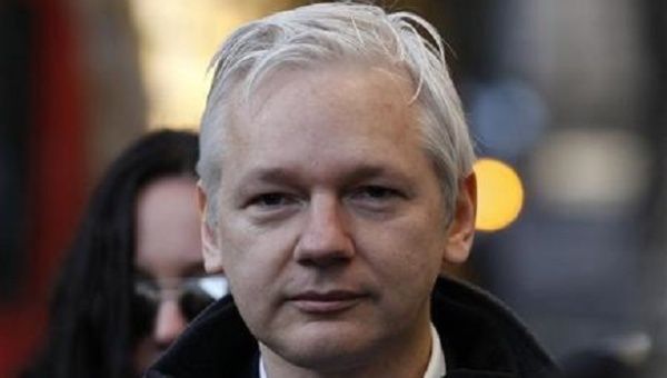 WikiLeaks founder Julian Assange arrives at the High Court in London Dec. 5, 2011.