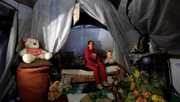 Maria Guadalupe Padilla rests in her tent in the Tlalpan neighborhood. 