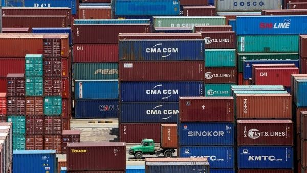Shipping containers are seen at a port in Shanghai, China July 10, 2018. 