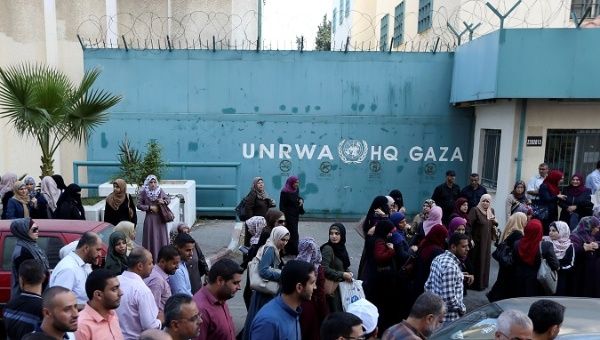 Palestinian employees of United Nations Relief and Works Agency (UNRWA) take part in a protest against job cuts by UNRWA, in Gaza City September 19, 2018. 