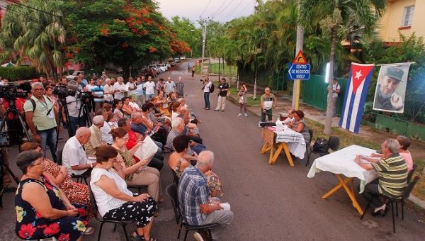 Cubans participate in a debate to discuss the text of the proposed new constitution to vote on in a referendum next year. 