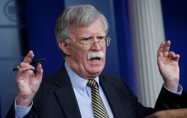 U.S. National Security Advisor John Bolton tells a reporter how he refers to Palestine during a White House press briefing in Washington, U.S., Oct. 3, 2018.