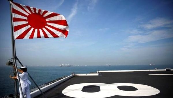 Japanese naval ships flying rising-sun flags previously participated in fleet reviews in South Korea in 1998 and 2008.