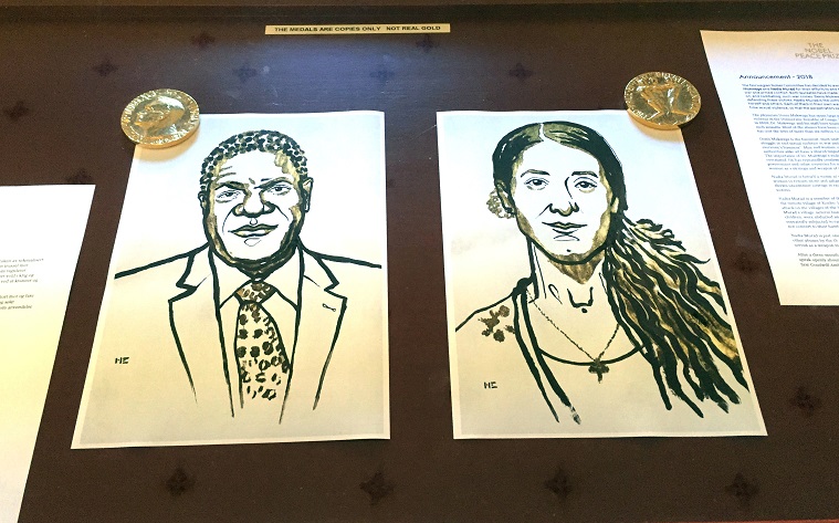 Drawings of Nobel Peace Prize winners Mukwege, left, and Murad on display in Oslo.