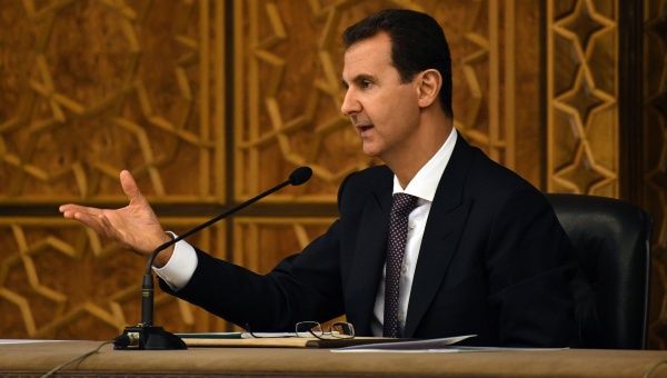 Syria's Assad meets with Iraqi security adviser in Damascus