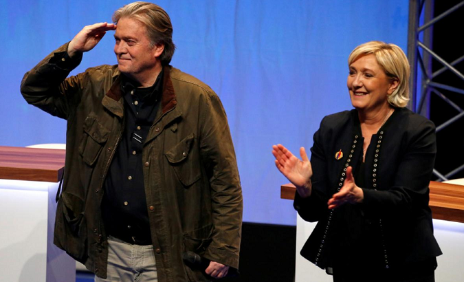 Marine Le Pen, National Front (FN) political party leader, and Former White House Chief Strategist Steve Bannon attend the party's convention in Lille, France, Mar. 10, 2018.