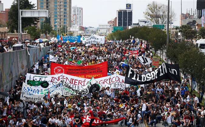 Students take part in a march during a demonstration in Bogota.