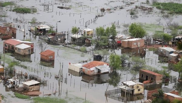 Area flooded after heavy rains caused Paraguay River to overflow on the outskirts of Asuncion.