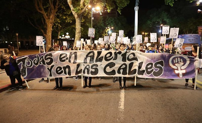 Hundreds of people protest the 20th femicide in Uruguay this year.
