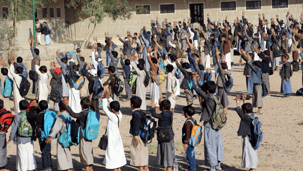 Yemeni children who lost dozens of classmates due to a Saudi strike on a school bus practice morning drills.