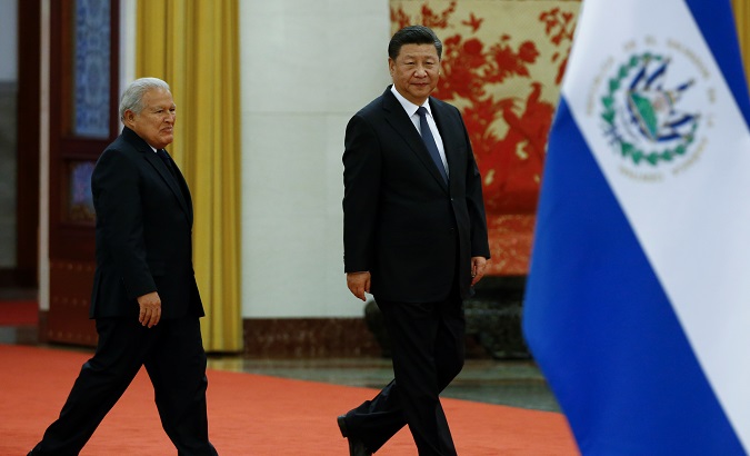 El Salvador's President Salvador Sanchez Ceren and Chinese President Xi Jinping attend a welcoming ceremony at the Great Hall of the People in Beijing.