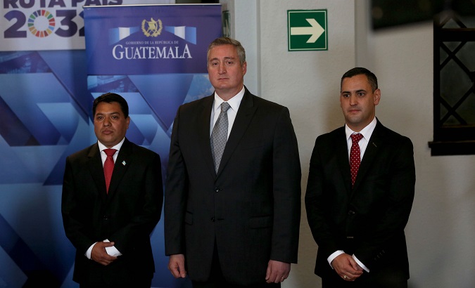 Interior Minister Enrique Degenhart (C) and his deputy ministers Kamilo Rivera (L) and Manuel Castellanos (R) after being sworn in. Guatemala City, Guatemala. Jan. 26, 2018.