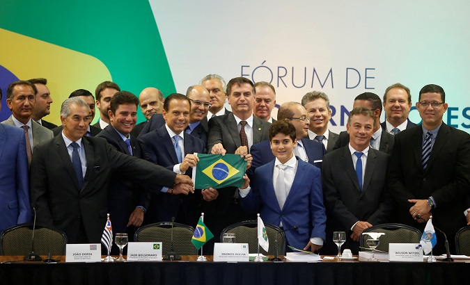 Brazil's President-elect Jair Bolsonaro poses for a photograph with all male governors-elect in Brasilia, Brazil Nov. 14, 2018.