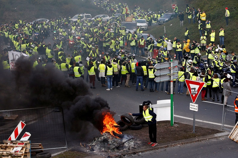 Demonstrators have blocked highways across the country with burning barricades and convoys of slow-moving trucks.