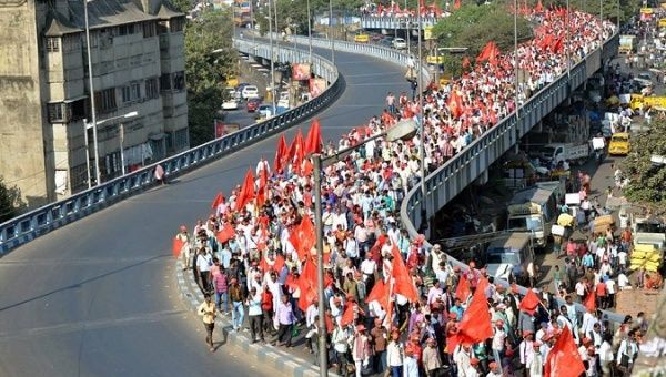 Farmers march in Kolkata organized by the Communist Party of India (Marxist) demanding a dignified life.