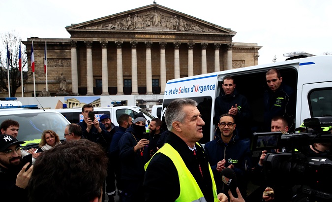 France's Snowballing Discontent: Ambulances Block Assembly.