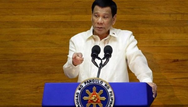 Duterte Threatens China with 'Suicide Mission' over Island