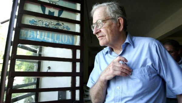 Chomsky joins Cambridge University academics urging the institution to divest from fossil fuel industries. 