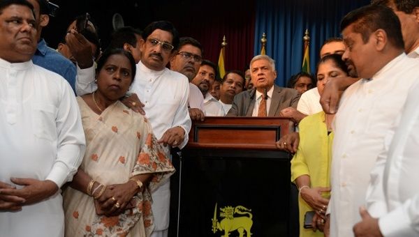 Sri Lanka's Prime Minister Ranil Wickremesinghe addresses his supporters and the party members after assuming duties in Colombo, Sri Lanka Dec. 16, 2018. 