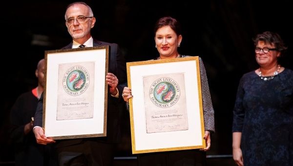 Ivan Velasquez (L) of Colombia and Thelma Aldana of Guatemala receive this year's Right Livelihood Honorary Award 