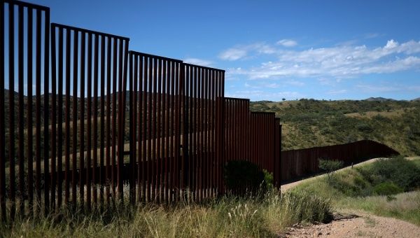 Different generations of the U.S. border wall with Mexico are seen from the United States in Nogales, Arizona