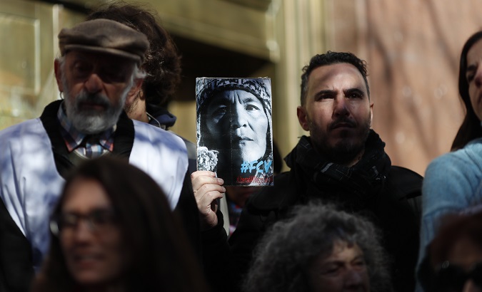 Milagro Sala supporters hold a picture of the activist at a press conference in Buenos Aires, Argentina, July 2017.