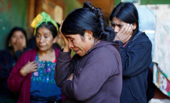 Catarina Alonzo (C), mother of Felipe Gomez Alonzo, at home in the village of Yalambojoch, Guatemala, December 2018.