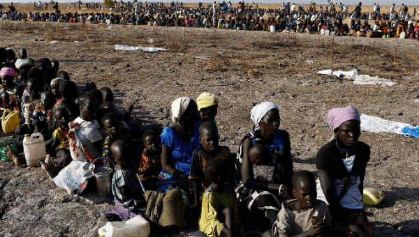 Women and children wait to be registered prior to a food distribution carried out by the United Nations World Food Programme (WFP) in Thonyor, Leer state, South Sudan, February 26, 2017