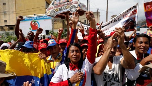 Supporters of Venezuela's President Nicolas Maduro gather around Supreme Court during his swearing-in ceremony, in Caracas, Venezuela Jan. 10, 2019.