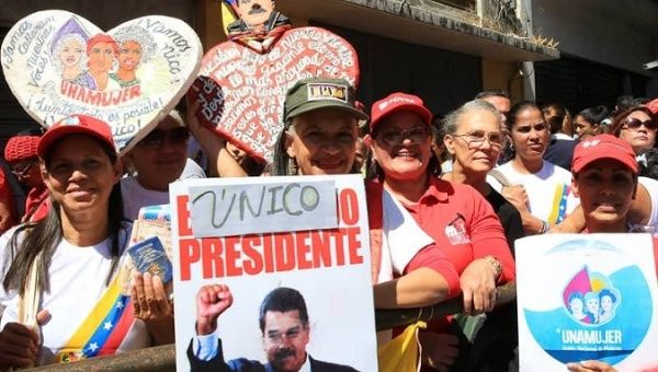 Social groups, community leaders, diplomats, and members of the public arrived the Plaza Bolivar in Caracas Saturday.