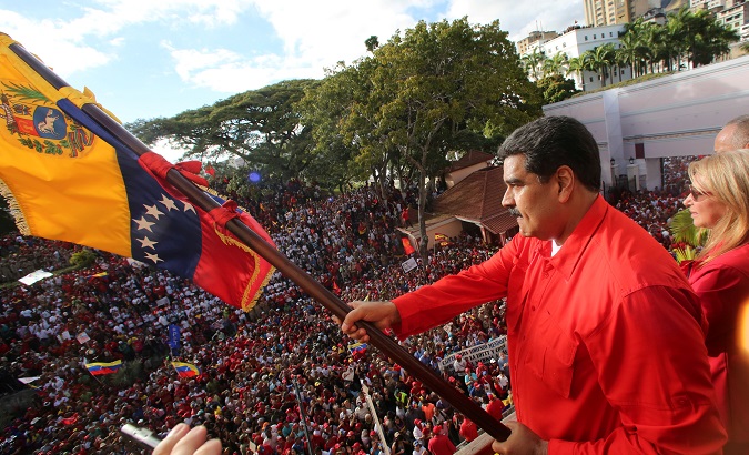 Venezuela's President Nicolas Maduro attends a rally in support of his government and to commemorate the 61st anniversary of the end of the dictatorship of Marcos Perez Jimenez in Caracas, Venezuela Jan. 23, 2019.