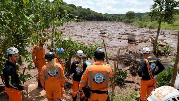 Rescue workers are seen after a dam, owned by Brazilian miner Vale SA, burst in Brumadinho, Brazil Jan. 26, 2019.