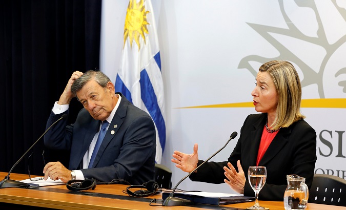 Federica Mogherini, High Representative of the Union for Foreign Affairs and Security Policy and Uruguayan Foreign Minister Rodolfo Nin Novoa attend a news conference.