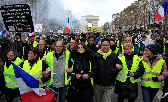 Yellow Vests protesters take part in a demonstration in Paris, France, Feb. 9, 2019.