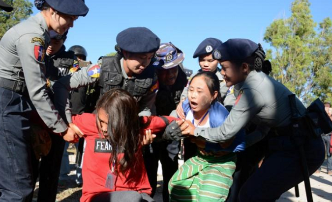 Police officers arrest activists during a protest against a statue of General Aung San, Myanmar's independence in Loikaw, Kayah state, Myanmar February 7, 2019.