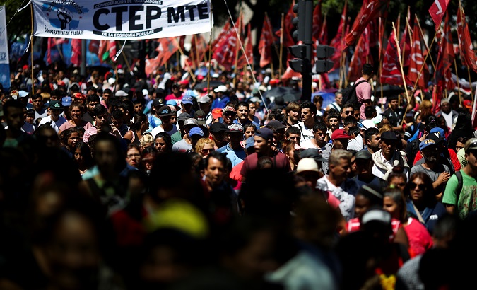 Demonstrators march during a protest against the increase of public rates, in Buenos Aires, Argentina, February 13, 2019.